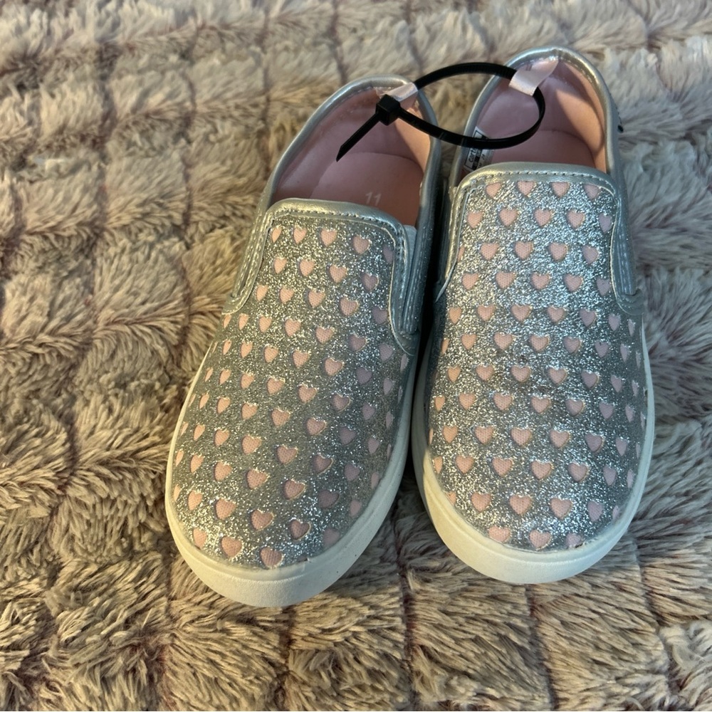 Carter's Slip On Girl Sneakers
Size. 11 With A Pop Hearts & Glitter